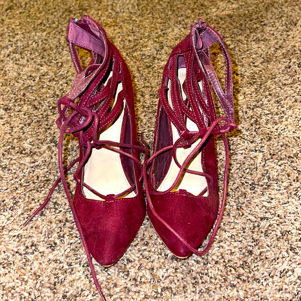 Lace up red velvet heels